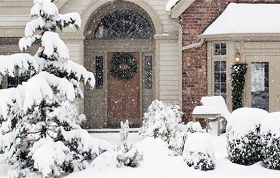 snowy brick house