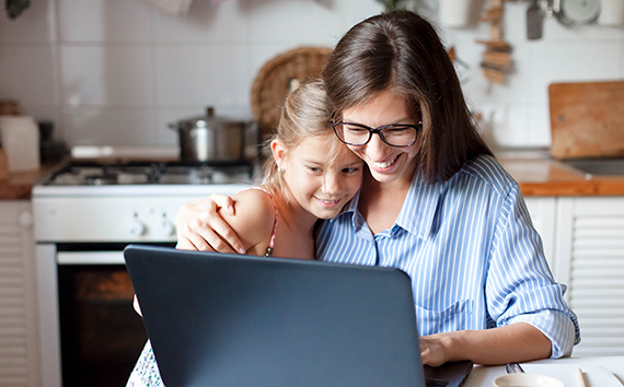 mother with child paying bills