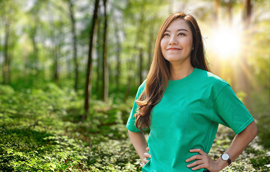 smiling woman in forest