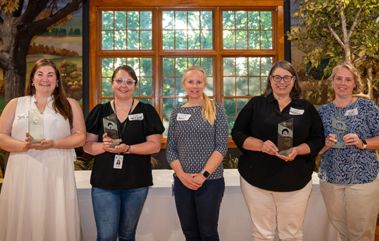 Aquarion's 2022 Environmental Champion Award winners posing for a group photo